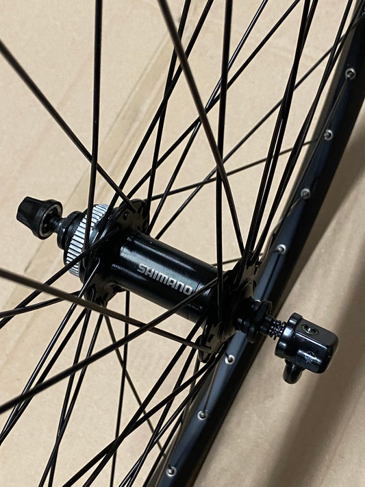 Voorwiel 27" 21-584 Taurus alu. zwart Shimano TX505 schijfrem