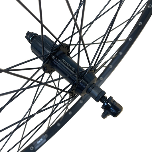 Achterwiel 26" 19-559 alu. ZAC19 Shimano RM30 cass. 8V. QR zwart