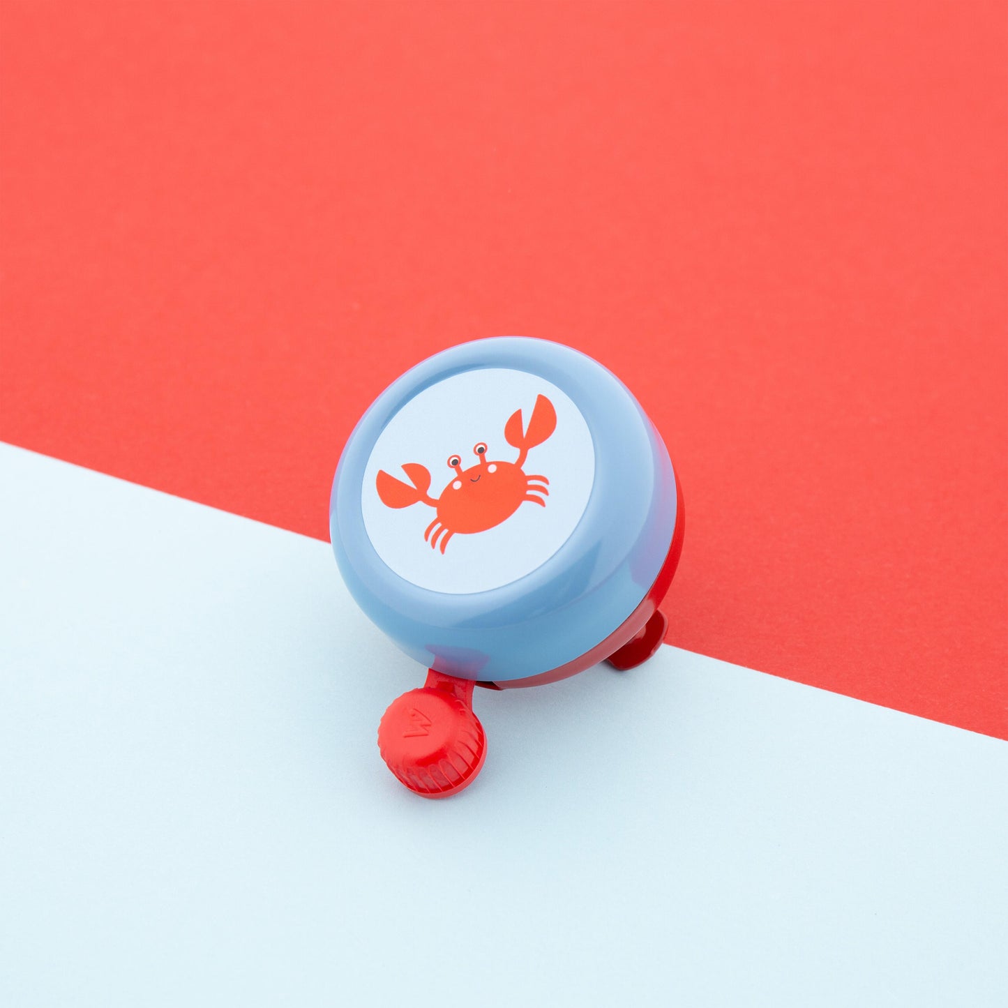Widek kinderbel Explorer Clappy Crab rood/blauw op kaart