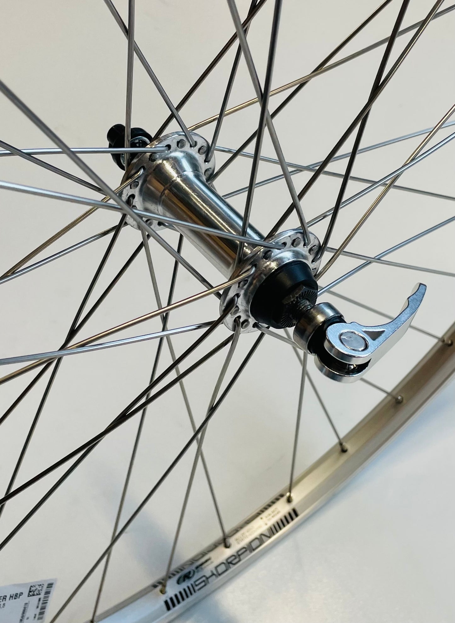Voorwiel 28"- 622X19 Skorpion alu. zilver FM21 QR sp. 14 RVS