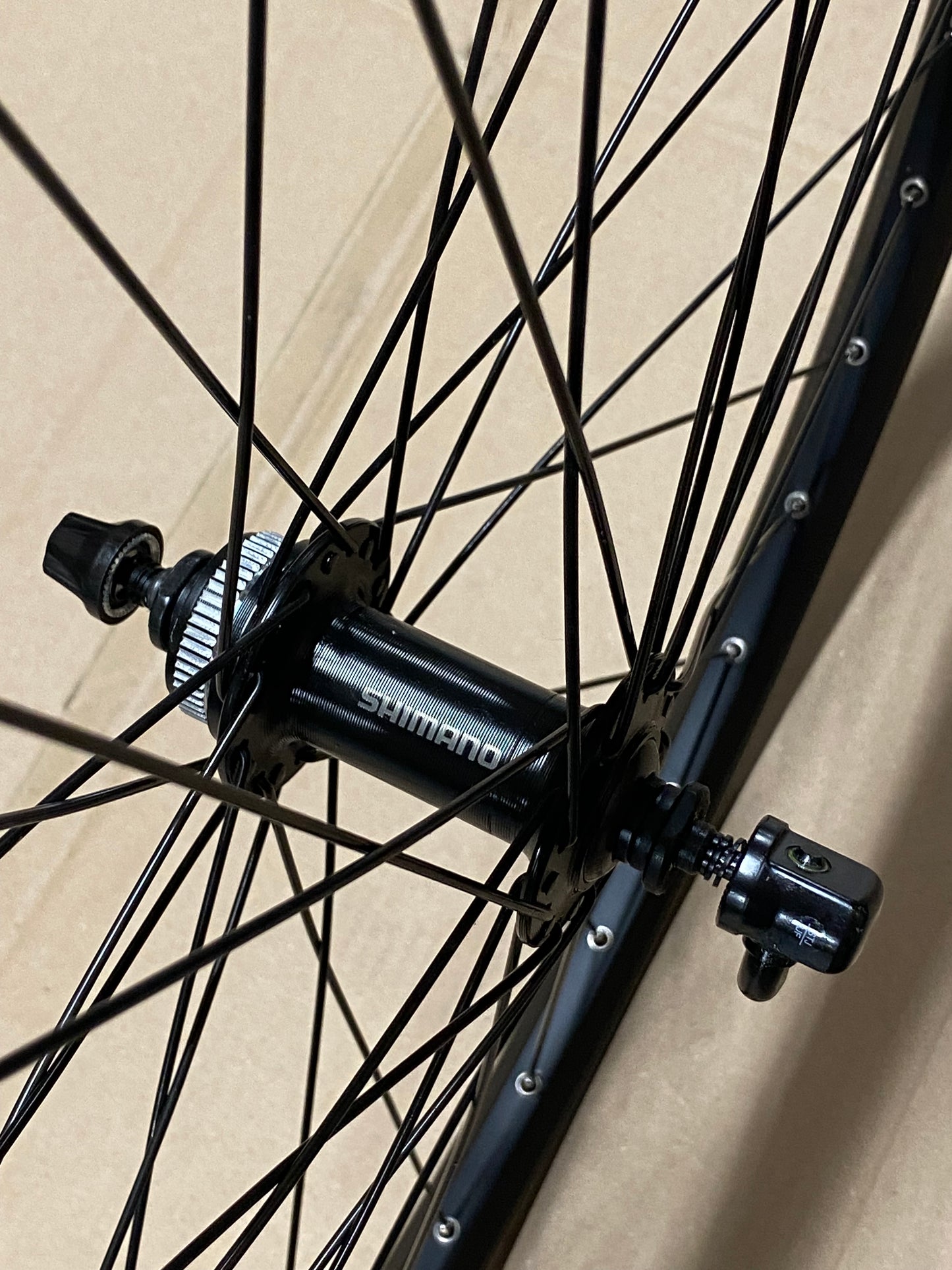 Voorwiel 27" 21-584 Taurus alu. zwart Shimano TX505 schijfrem