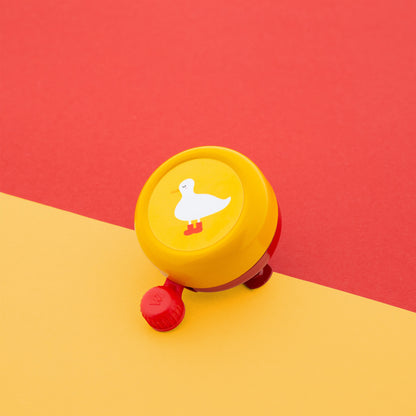 Widek kinderbel Explorer Sleepy Duck rood/geel op kaart