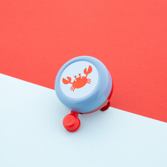 Widek kinderbel Explorer Clappy Crab rood/blauw op kaart
